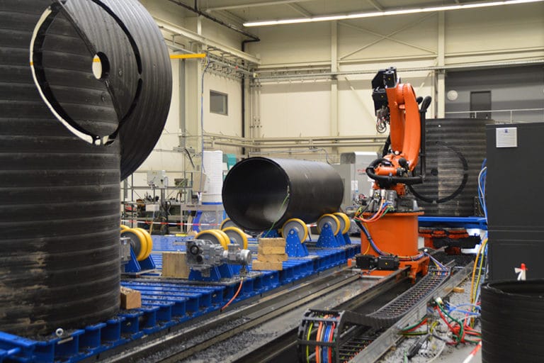 Installation of a robotized RFA machining centre for high-volume plastic pipes